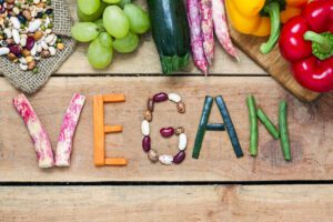 the Word Vegan Written in Veggies Kavahana