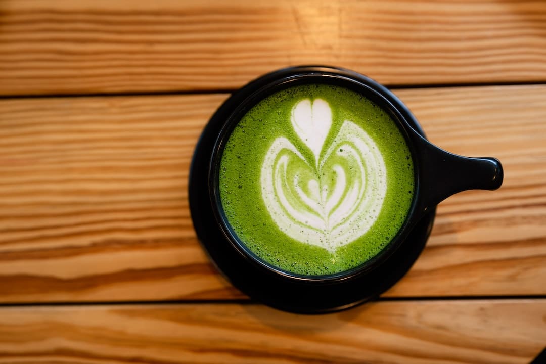Mug of Matcha Tea with Foam Art   Kavahana