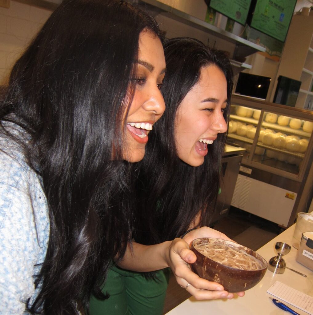 Hannah and Friend Laughing with Iced Kava Nectar Kavahana Kavahana