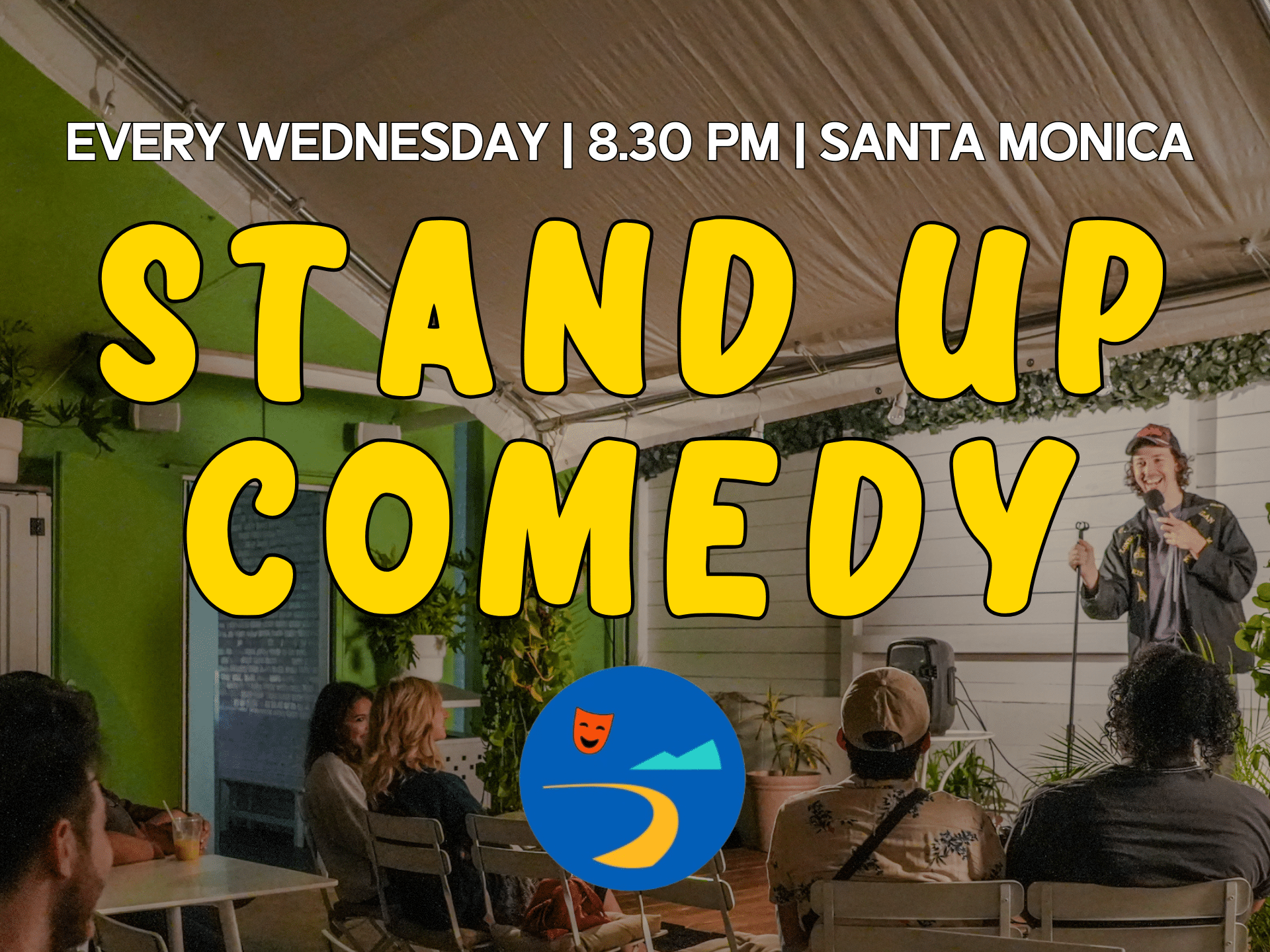 a Stand up Comedy Night at Kavahana in Santa Monica Featuring a Comedian Performing on an Outdoor Stage Under a Canopy the Audience is Seated at Tables Enjoying the Show in a Cozy Plant filled Setting Bold Yellow Text Overlays the Image Announcing stand Up Comedy Along with Event Details every Wednesday | 9 Pm | Santa Monica Kavahana