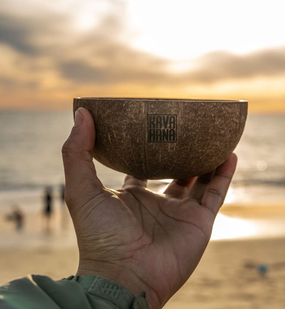 Hand Holding Kavahana Bowl at Sunset Kavahana