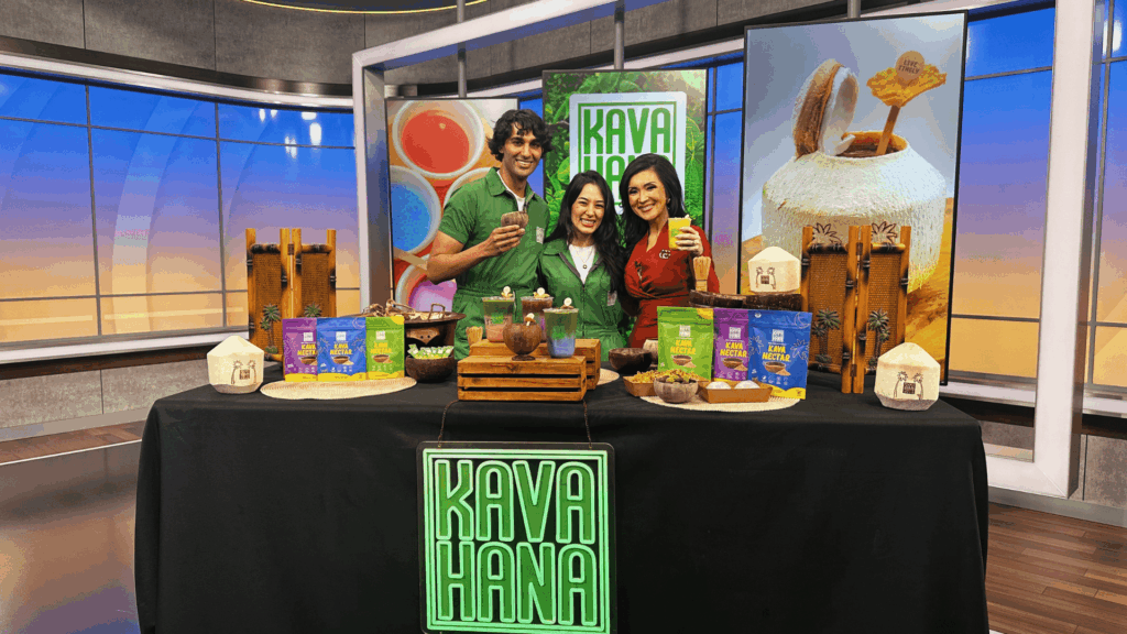 Kavahana Featured on Kcal News Cbs Los Angeles Min >thisisjustarandomplaceholder<kavahana a Photo of Kavahana Founders Standing Beside a Kcal News Los Angeles Anchor on Set Holding Kava Nectar Drinks the Table is Filled with Coconut Shells Colorful Kava Nectar Bags and Handcrafted Drinks the Kavahana Logo is Displayed Behind Them Along with Kcal News and Cbs News Los Angeles Branding Kavahana