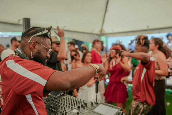 Kavahana Community Dance Party Live Dj Event >thisisjustarandomplaceholder<kavahana Live Dj Playing Music While Guests Dance at a Kavahana Community Event Kavahana